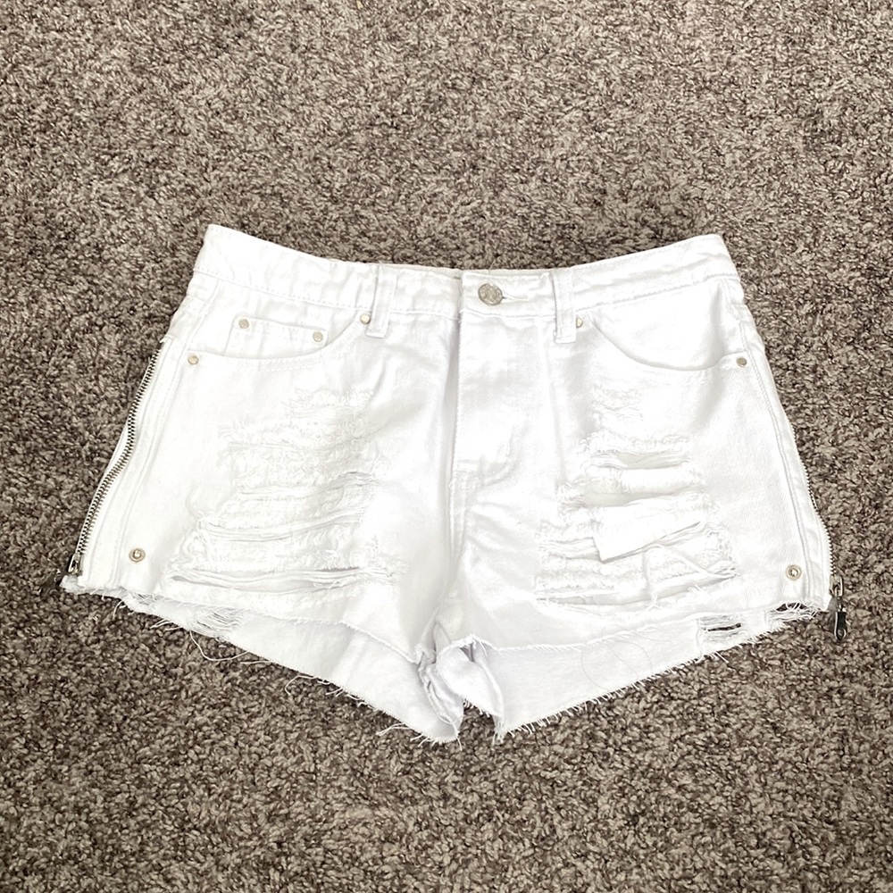 White denim distressed shorts